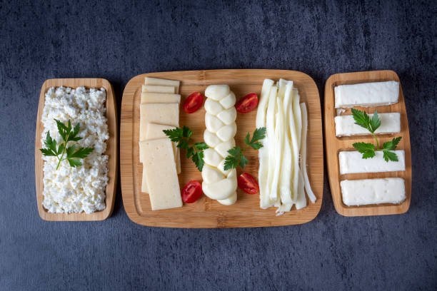 istock Traditional various cheeses, string, knitted and cecil cheese, turkish delicatessen concept 1399431444