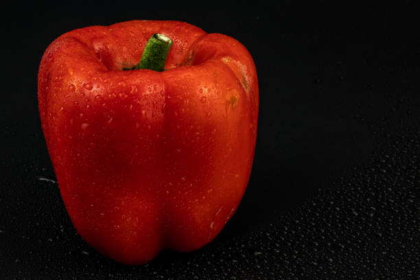 Ripe bell pepper. Washed ripe bell pepper with water droplets