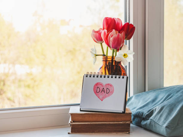 istock Notepad with the word DAD. Close-up, indoors 1399432922