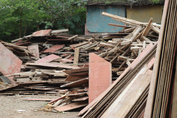 istock Pile of different size wooden boards used for supporting various concrete construction structures 1399434428