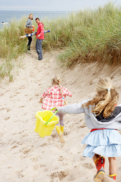 istock Family having fun on beach vacation 139944062