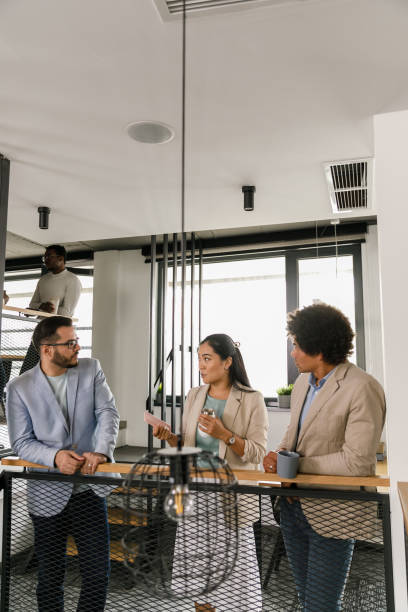 istock Business colleagues hanging out during coffee break at the office 1399442886