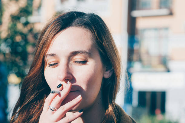 istock real attractive girl smokes a cigarette 1399444371