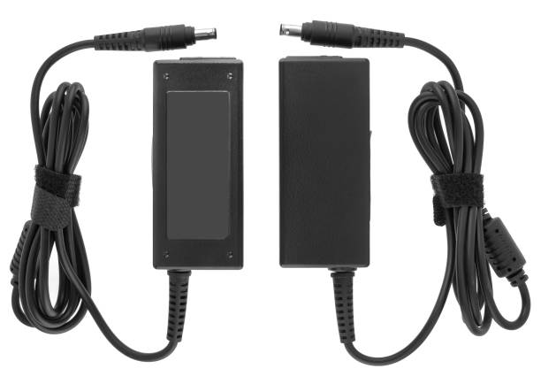 istock power supply for laptop, spare part for computer, on a white background 1399446103