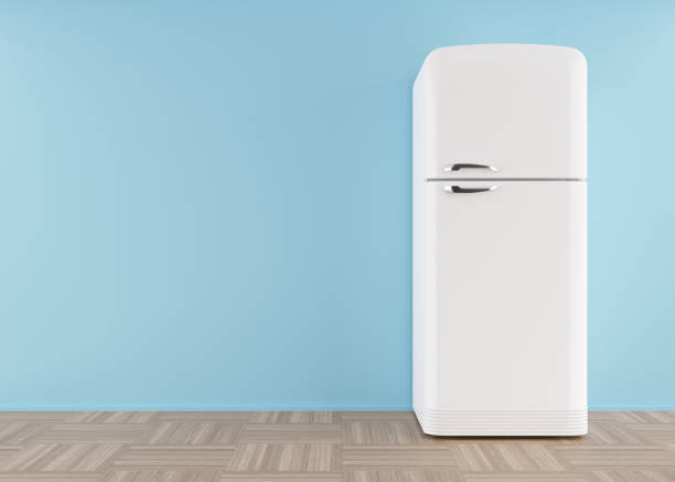 istock Refrigerator standing in empty room. Free, copy space for text or other objects. Household electrical equipment. Modern kitchen appliance. White fridge with freezer. 3d rendering. 1399446366
