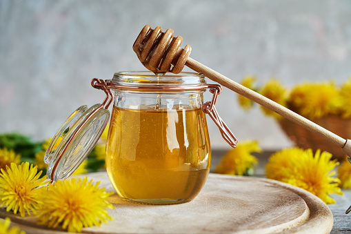 Dandelion honey made from fresh flowers collected in spring
