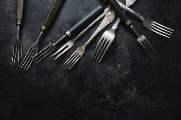 istock Vintage rustic cutlery on dark 1399449769