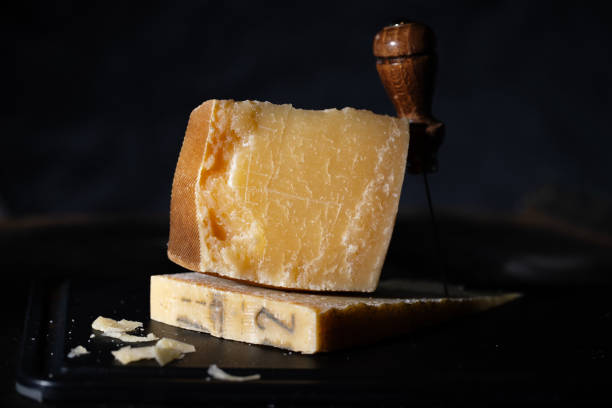 istock Parmesan cheese on wooden board 1399449837
