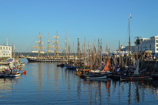 Naval base in the port of Toulon France. The French military move in three motorboats near their base in Toulon.