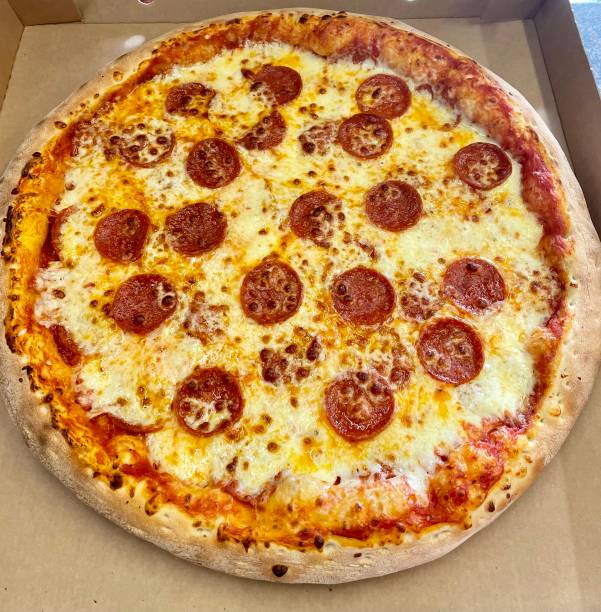 istock Pepperoni pizza with a lot of cheese 1399476812