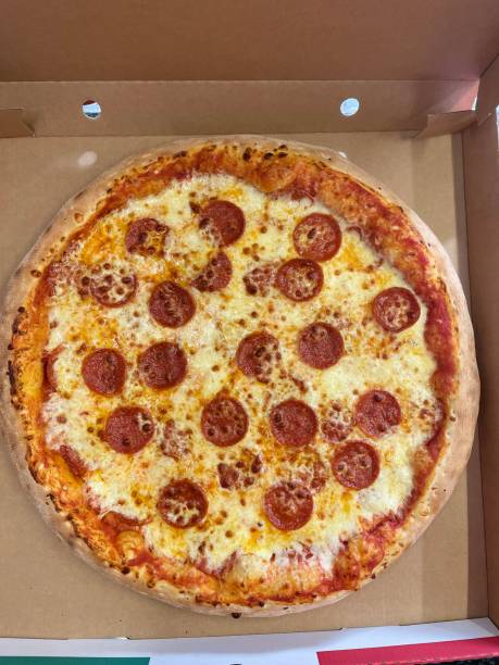 istock Pepperoni pizza with a lot of cheese 1399476819