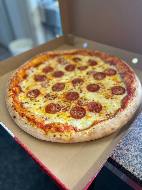 istock Pepperoni pizza with a lot of cheese 1399476831