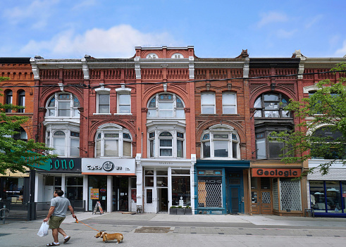 Toronto, Ontario, Canada - May 26, 2022: West Queen  Street in Toronto has well preserved 19th century buildings with quirky stores