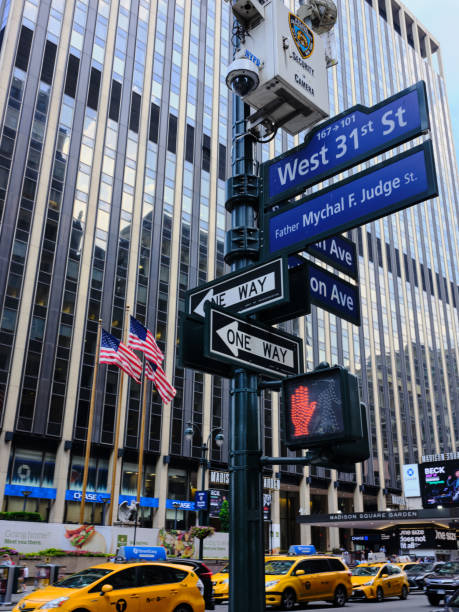 New York City, USA - July 13th, 2018. New York City, USA - July 13th, 2018. - Sign boards scattered on a lamp post shows a busy life of the city. song title stock pictures, royalty-free photos & images