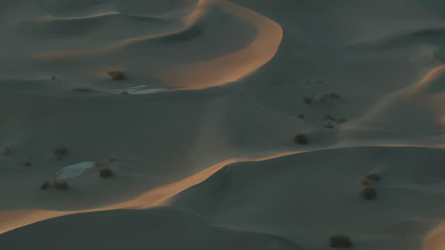 Dreamlike Aerial Drone Fly Over view of Sand Dunes in Death Valley California.