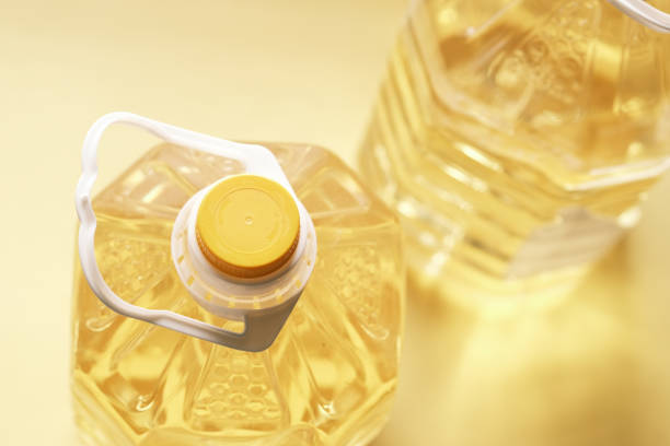 istock yellow sunflower oil bottle on table 1399494527