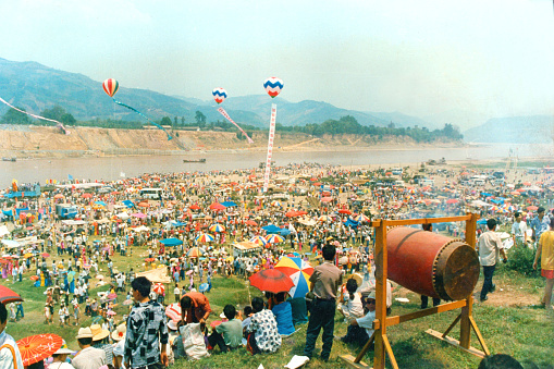 In China it is called Water Splashing Festival, also known as Songkran festival in Thailand.The main aboriginal people in Xishuangbanna, Yunnan province, China are called Dai Tribe, aiso is Thai  Ethnicity.The festival lasts for several days, with dragon-boat races, water splashing, traditional songs and dances, fairs and more.Film photo in April 1995,Xishuangbanna,Southern Yunnan