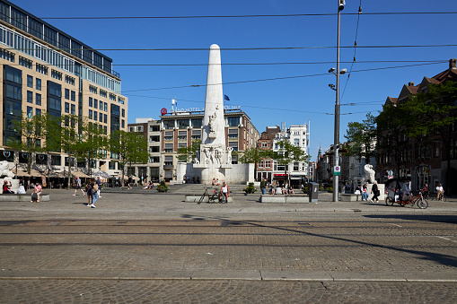 The Dam Square on a summer day in Amsterdam, The Netherlands
