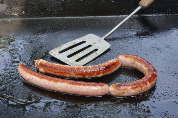 istock Chipolata cooked on a plancha hob 1399503234