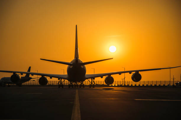 istock sunset view of airplanes line up 1399507560