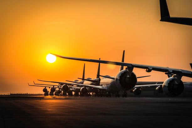 istock sunset view of airplanes line up 1399507563