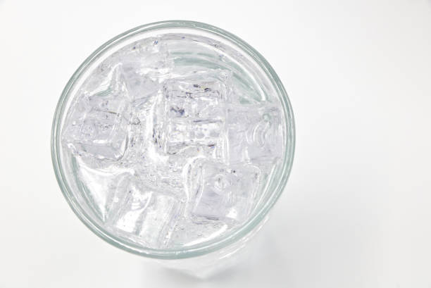 istock Soda sparkling water with Ice in glass over white background. 1399508659