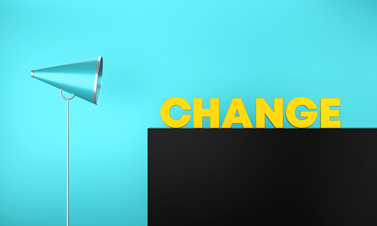 Megaphone With Change Message On Black Stand. Announcement and Communication Concept