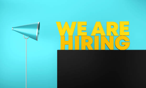 istock Megaphone With We are hiring Message On Black Stand. 1399510877
