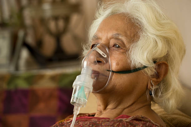 istock Old woman with oxygen mask 1399517765