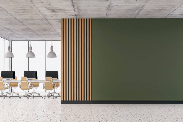 istock Empty office interior with copy space and work desks on terrazzo floor and paneled wall 1399520187