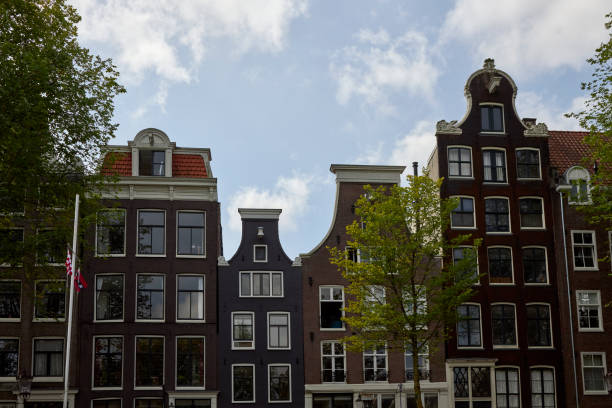 istock Amsterdam canal houses 1399521187