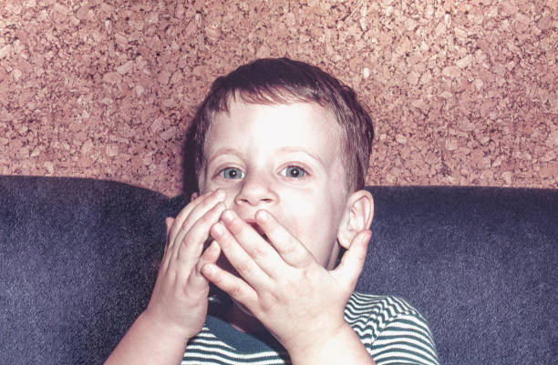 istock Boy portrait playing to the camera 1399521332