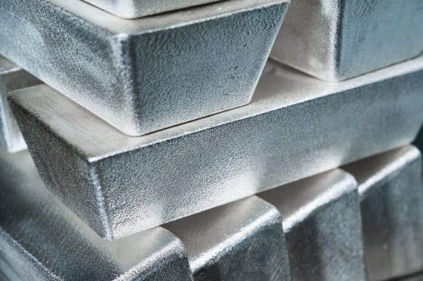 istock Stack of industrial silver ingots at bright light in storage 1399521628