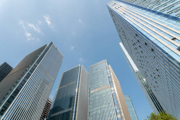low angle view of modern office buildings and skyscraper in downtown.
