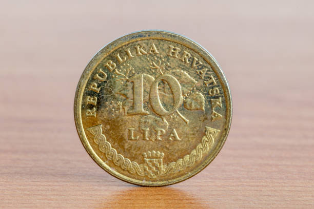 istock Croatian coin 10 lipa on wooden table. 1399522711
