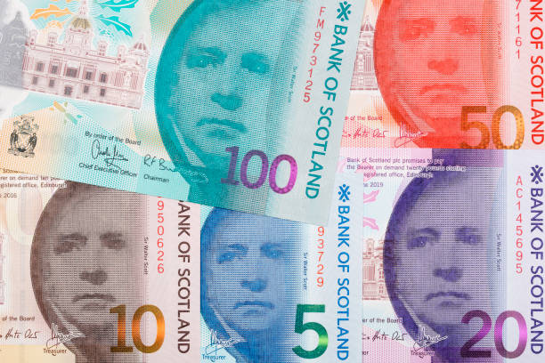 istock Scottish money - Pounds, a business background 1399524825