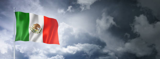 istock Mexican flag on a cloudy sky 1399526874