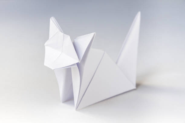 istock Paper cat origami isolated on a white background 1399527124