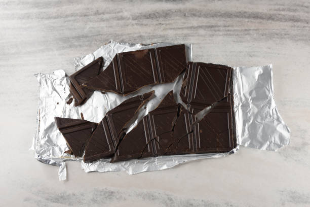 istock Chocolate bar pieces in the foil package 1399530114