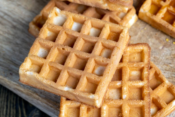 istock square sweet soft waffles on the table 1399530298