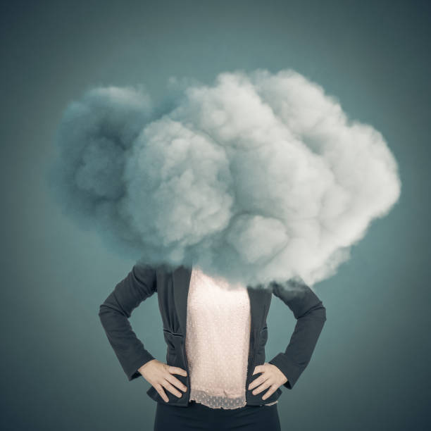 istock woman with head in the clouds 1399530499