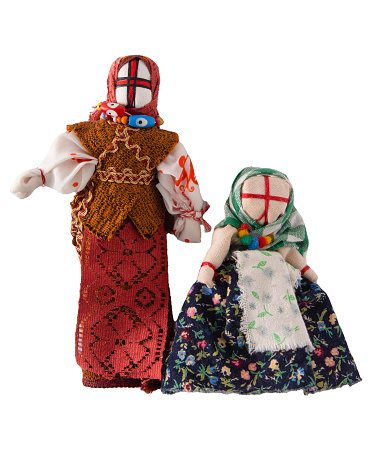 Lyalka motanka isolated on white background handmade. Ukrainian national doll amulet, silt patches and threads are made without a needle. Symbol of Ukraine. Motanka dolls Old toy
