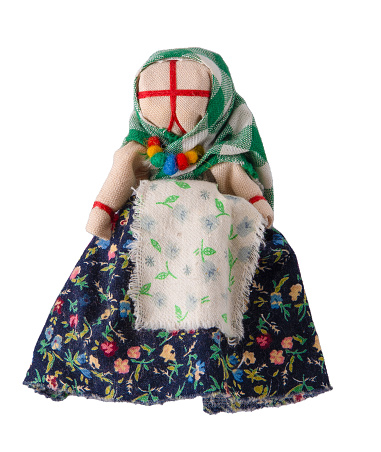 Lyalka motanka isolated on white background handmade. Ukrainian national doll amulet, silt patches and threads are made without a needle. Symbol of Ukraine. Motanka dolls Old toy