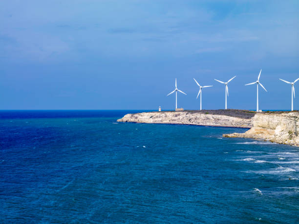 istock Wind Turbine and lighthouse 1399533300
