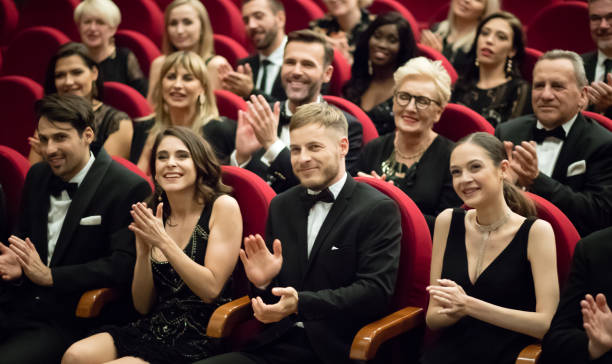 istock Excited audience clapping in opera house 1399535765
