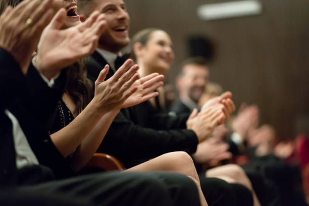 istock Excited audience clapping in the theater 1399535933