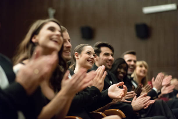 istock Excited audience clapping in the theater 1399536011