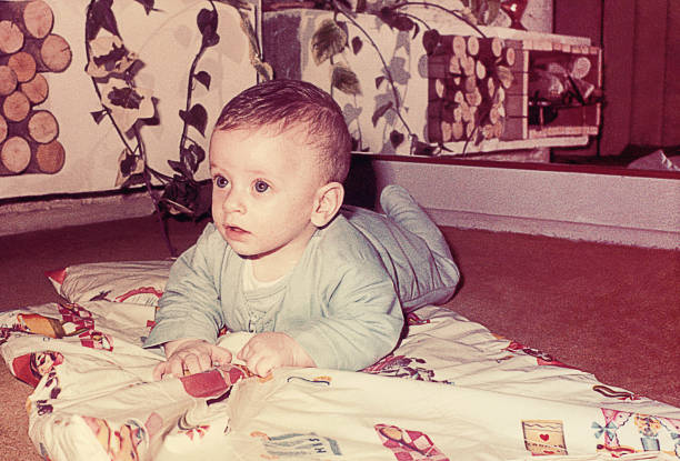 istock Vintage baby boy laying down at home 1399536088