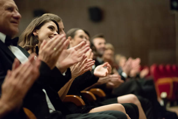 istock Excited audience clapping in the theater 1399536230