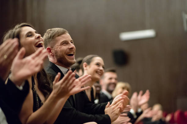 istock Excited audience clapping in the theater 1399536316